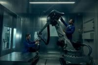 The NSIRC team working on a robotic arm.